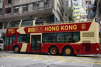 Red and Cream Big Bus Hong Kong Double Decker on City Street