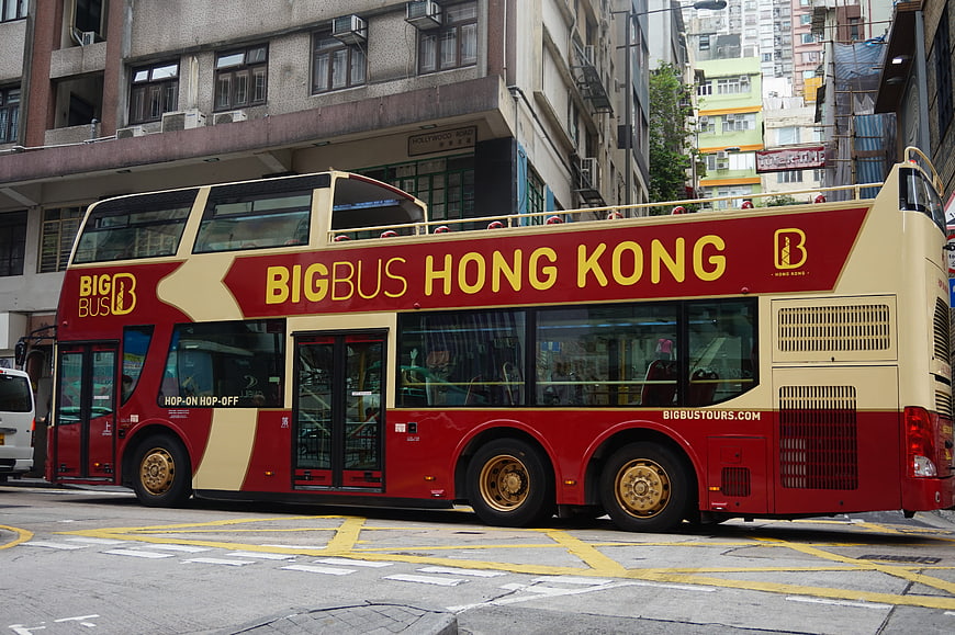Red and Cream Big Bus Hong Kong Double Decker on City Street