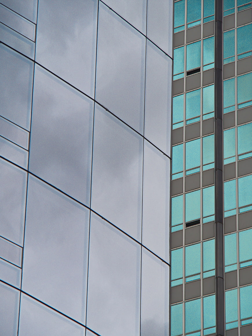Modern Glass Building Facade with Geometric Patterns