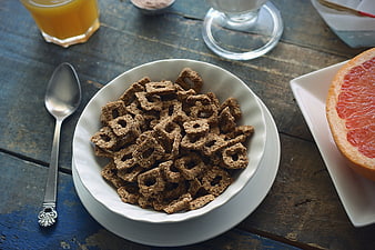 Healthy Breakfast Cereal Bowl with Grapefruit and Juice