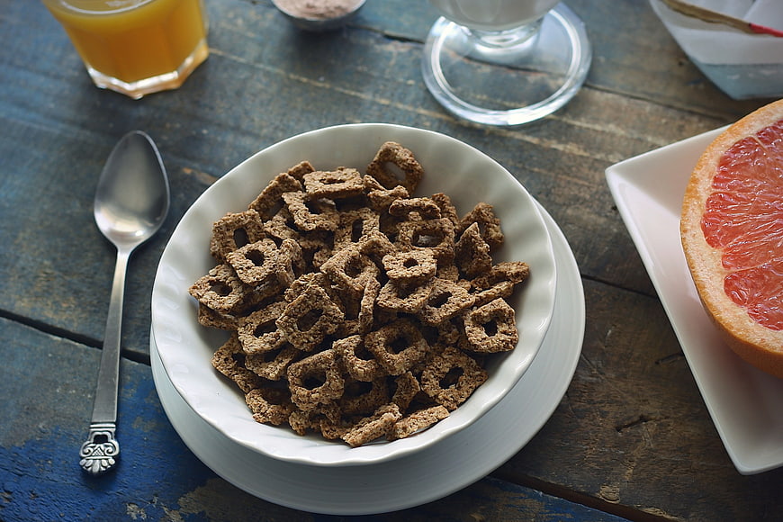 Healthy Breakfast Cereal Bowl with Grapefruit and Juice