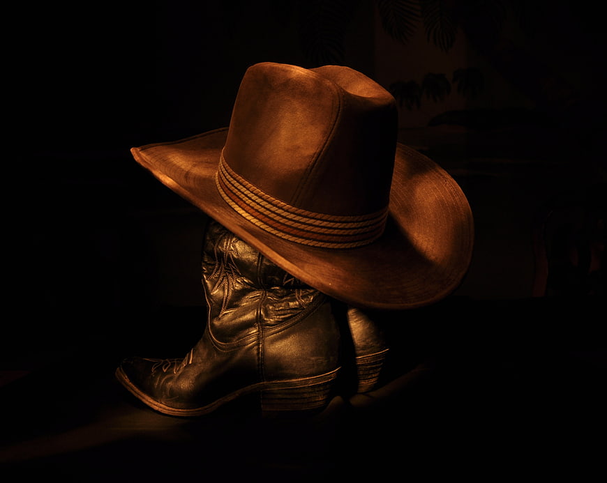Dramatic Cowboy Hat and Leather Boots Still Life