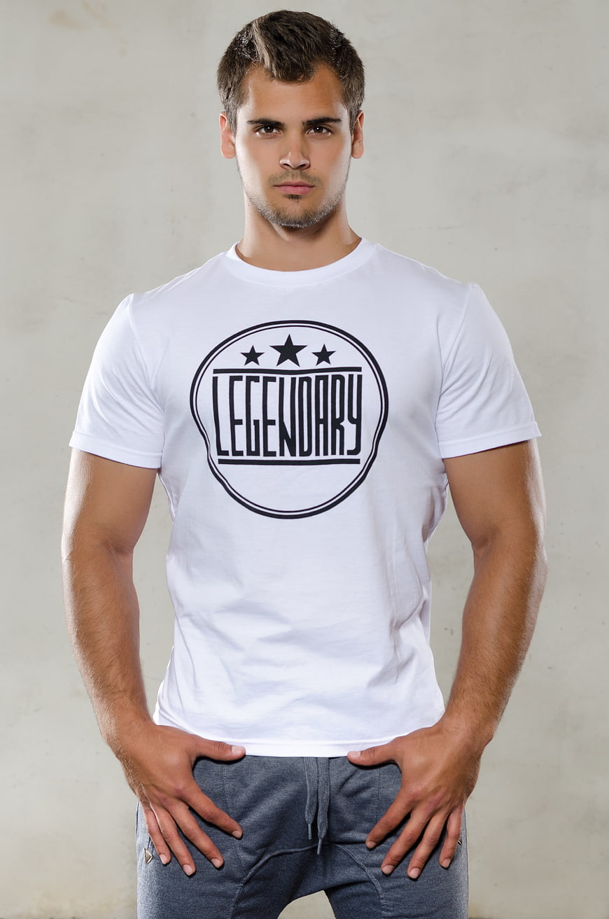 Male Model Wearing White T-Shirt with Legendary Logo
