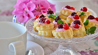 Puff Pastry Berry Tarts With Cream On Glass Cake Stand