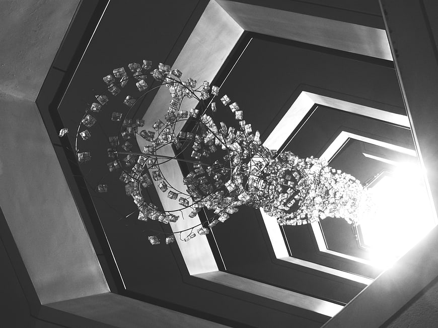 Modern Crystal Chandelier in Black and White Interior