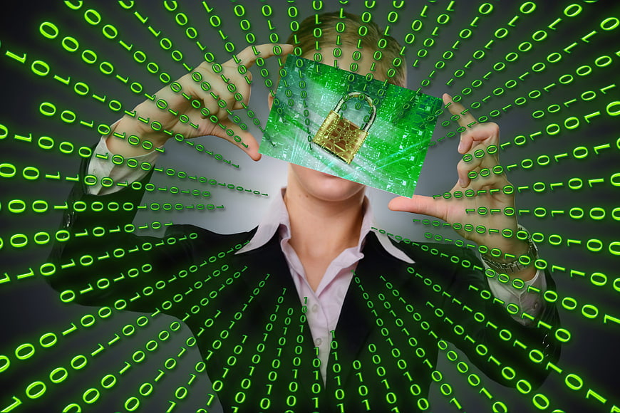 Businessman holding digital padlock with binary code background