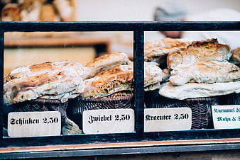 Artisanal German bread loaves in bakery display case