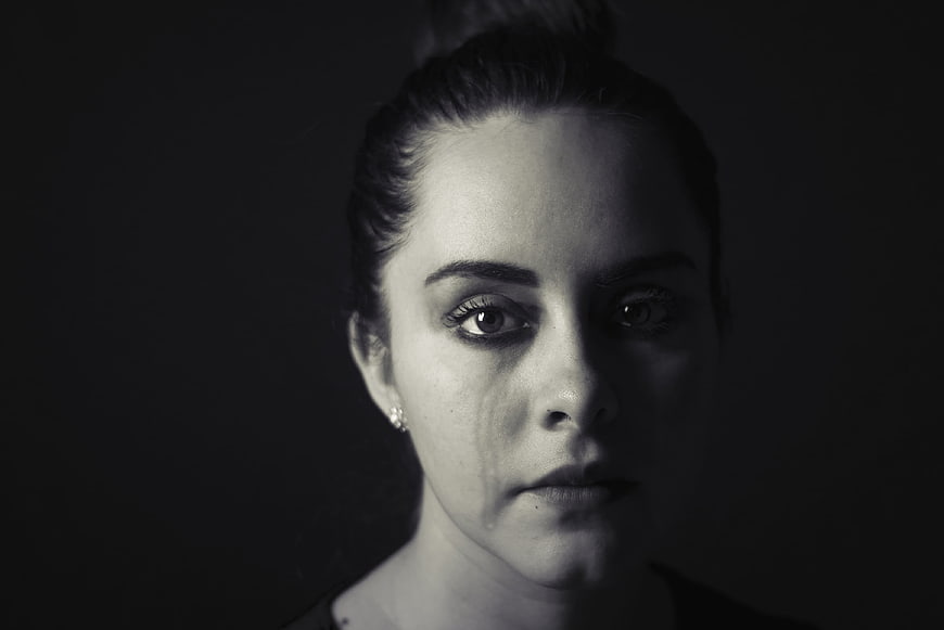 Emotional Black and White Portrait of Crying Woman
