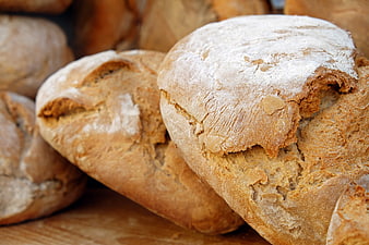 Freshly Baked Artisan Bread Loaves with Flour Dusting