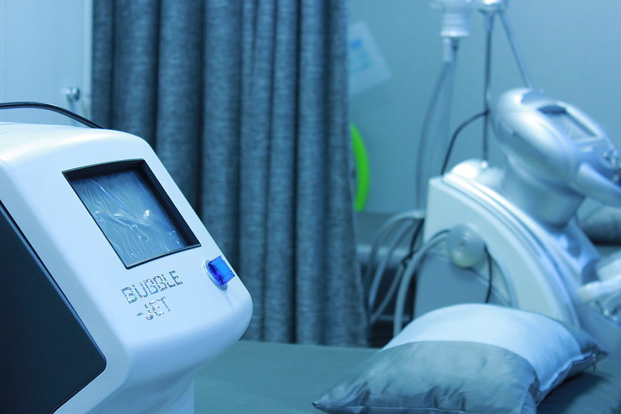 Medical laser device in dermatology clinic treatment room