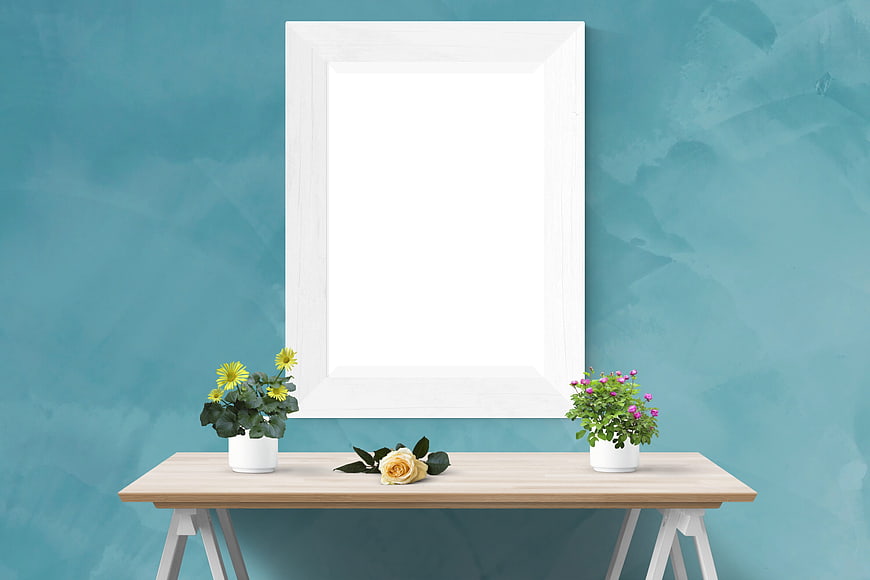 White Picture Frame Mockup on Wooden Table with Flowers