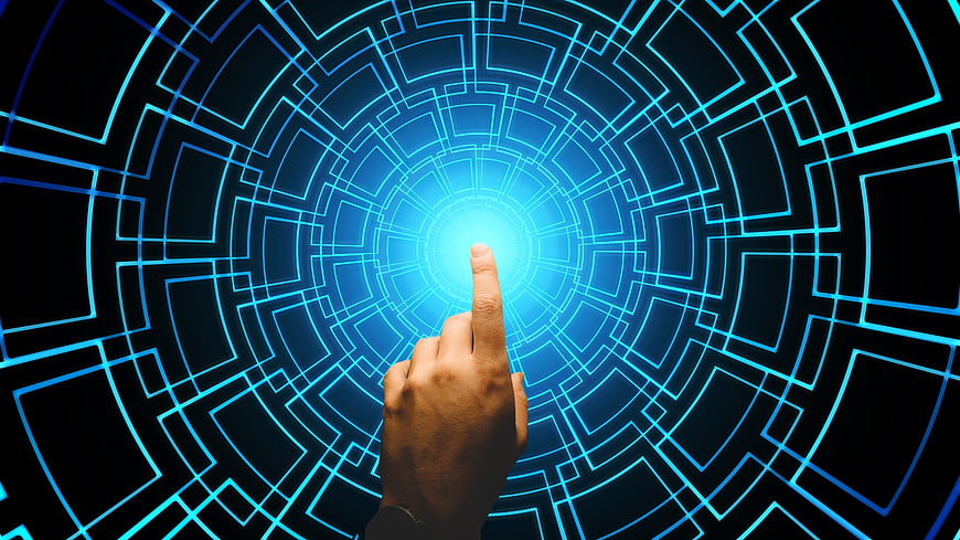 Hand Touching Futuristic Blue Digital Interface