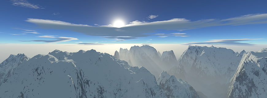 Panoramic Snow-Covered Mountain Range With Sun And Clouds