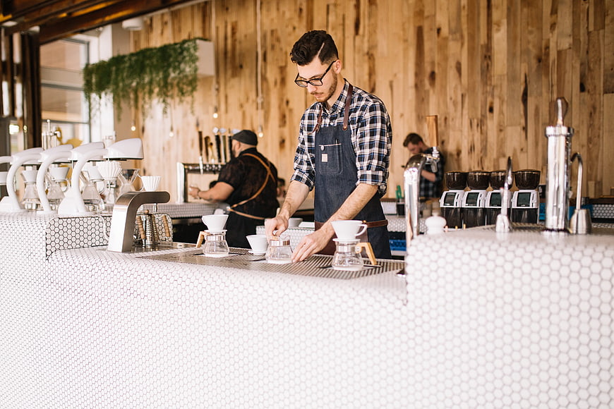 Barista Preparing Pour-Over Coffee In Modern Specialty Cafe