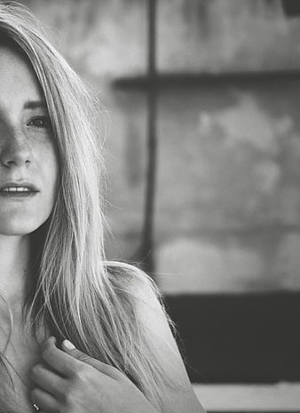 Black and white portrait of a woman with long hair
