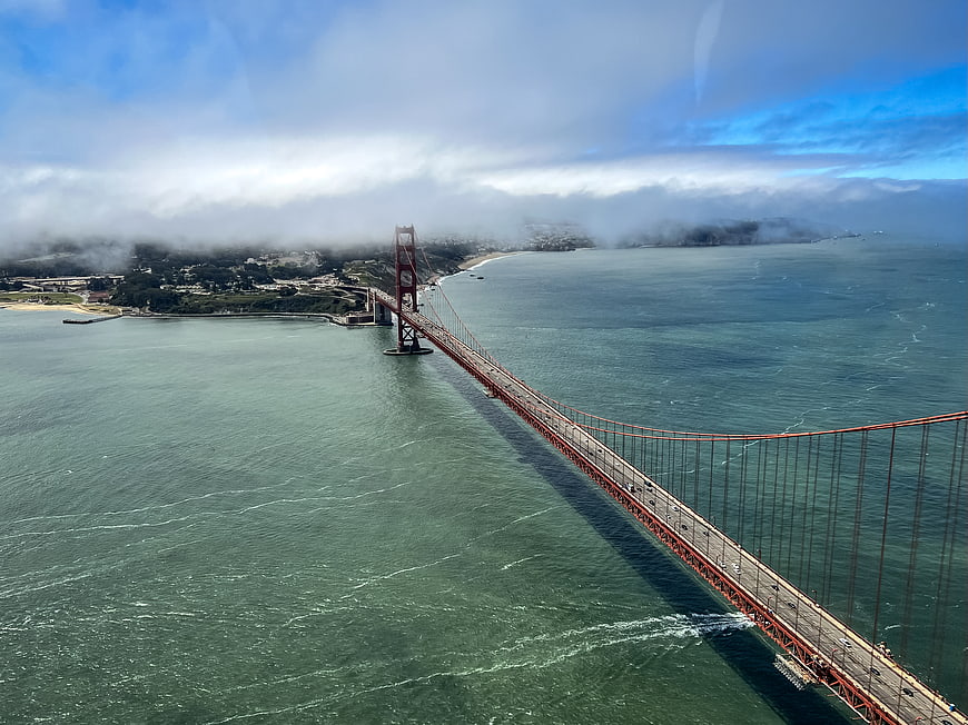 Aerial View of Golden Gate Bridge with Fog and Blue Sky