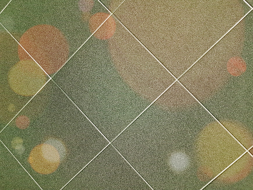 Abstract Green Textile Pattern with Bokeh Circles