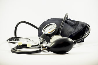 Sphygmomanometer and Stethoscope on White Background