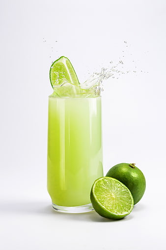 Fresh Lime Juice Splash on White Background