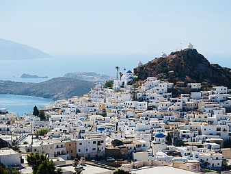 Panoramic View of White Cycladic Village on Greek Island Hillside