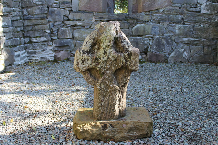 Ancient Celtic Cross Stone in Historic Monastery Ruins