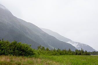 Misty Mountain Landscape with Green Foreground