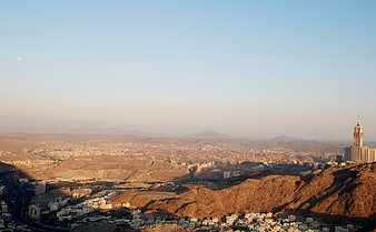 Aerial View of Mecca Cityscape with Minaret at Golden Hour