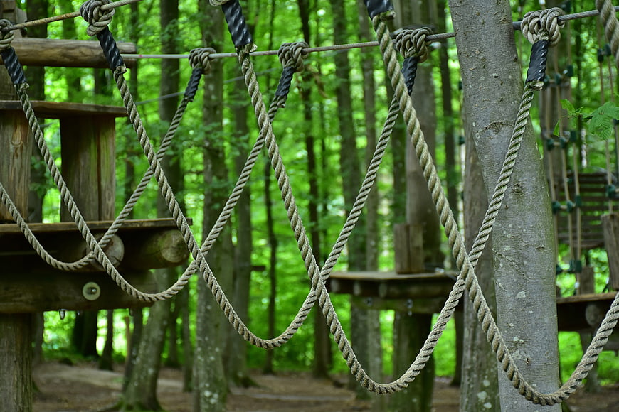 Rope bridge detail in forest adventure park