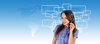 Smiling female customer service agent with headset and global communication graphics