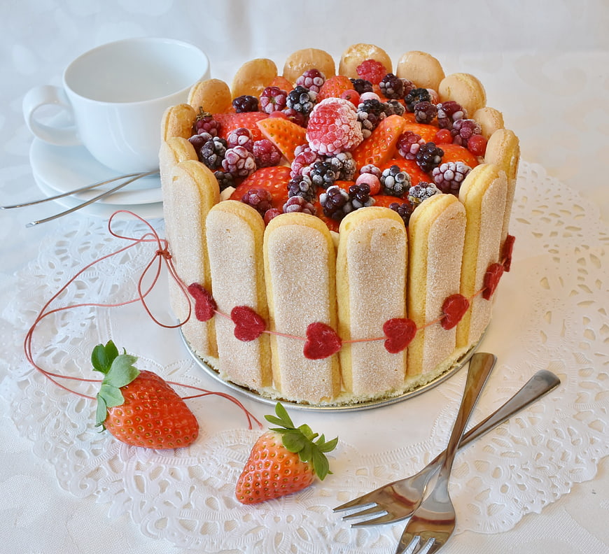 Homemade Strawberry Charlotte Cake with Fresh Berries and Coffee