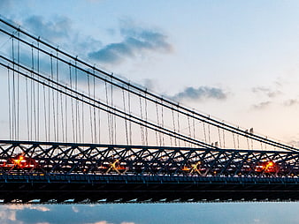 Williamsburg Bridge Steel Structure at Dusk with Reflection