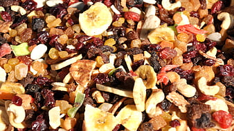 Close-up of mixed trail mix with dried fruits and nuts