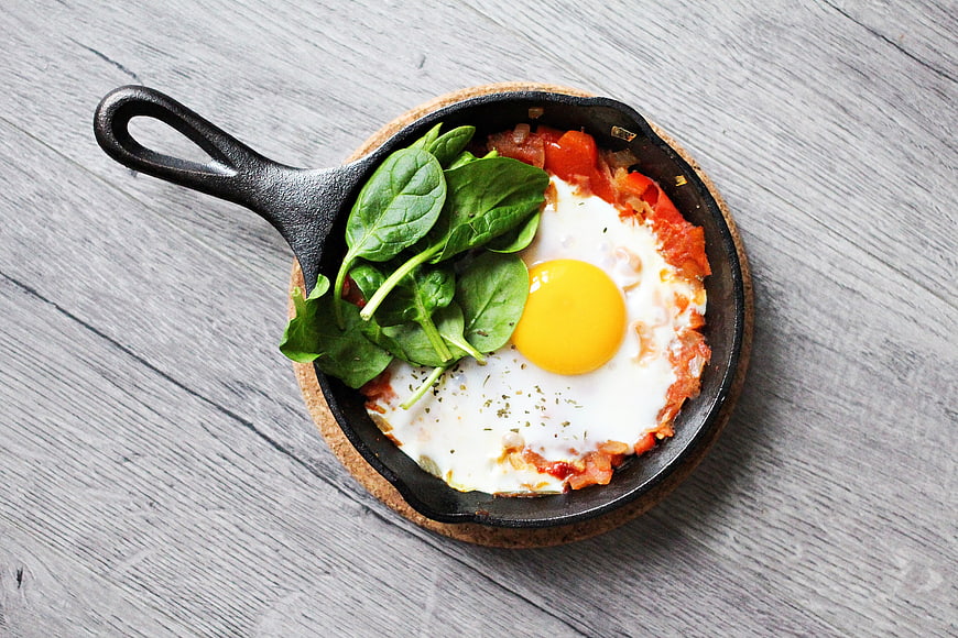 Sunny Side Up Egg with Spinach in Cast Iron Skillet