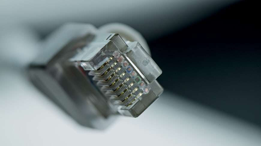 Close-up of RJ45 Ethernet Connector with Colored Wires
