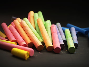 Colorful Chalk Sticks on Black Background
