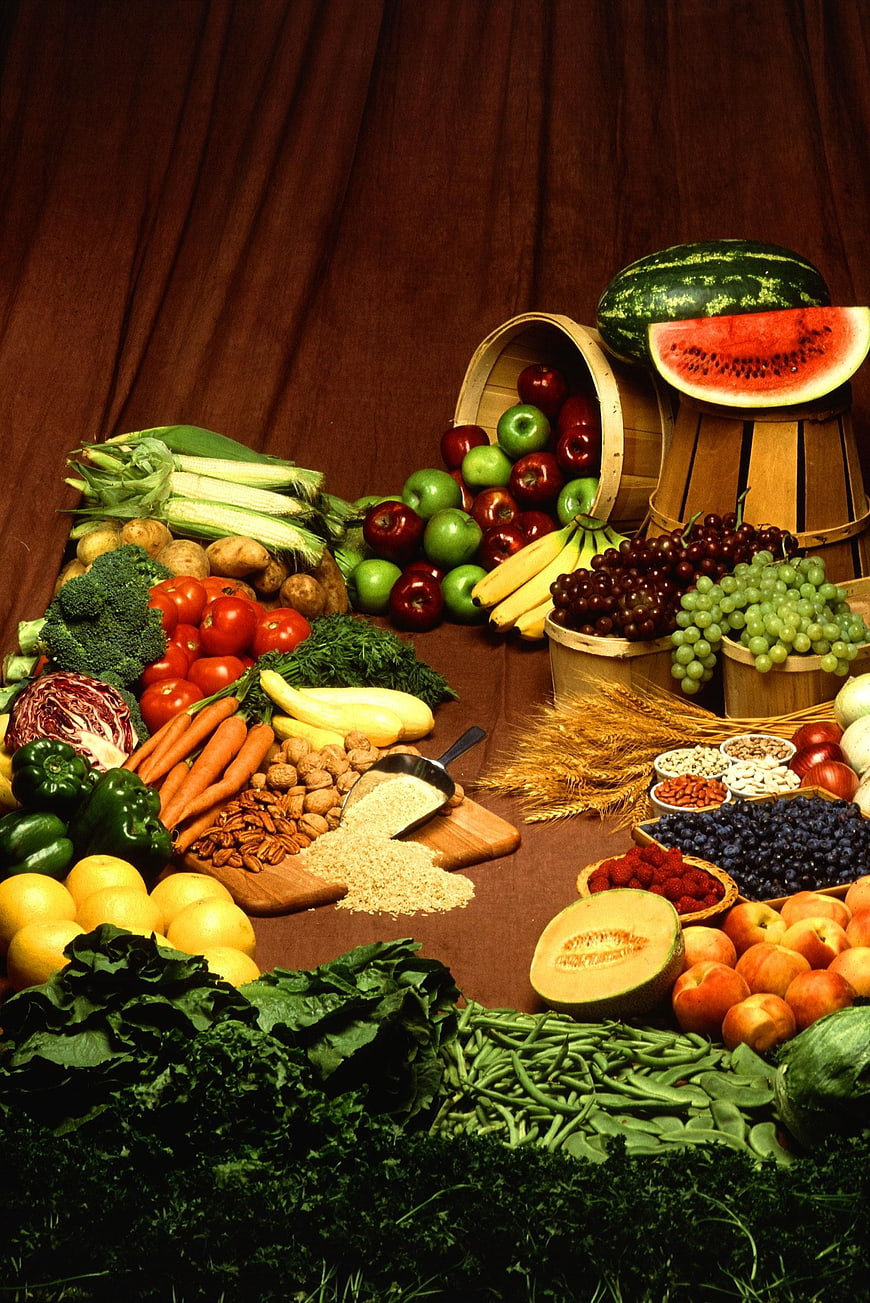 Abundant Harvest of Fresh Fruits and Vegetables on Wooden Table