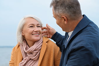 Senior couple sharing a tender moment outdoors
