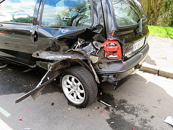 Damaged Black Car After Traffic Accident