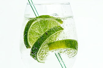 Refreshing Sparkling Lime Drink in Glass with Straw