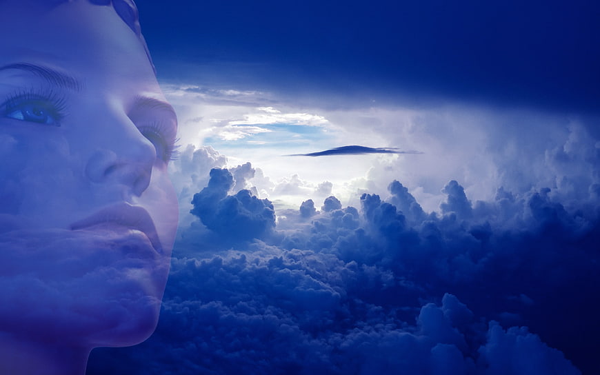 Double Exposure Woman Face and Clouds Sky