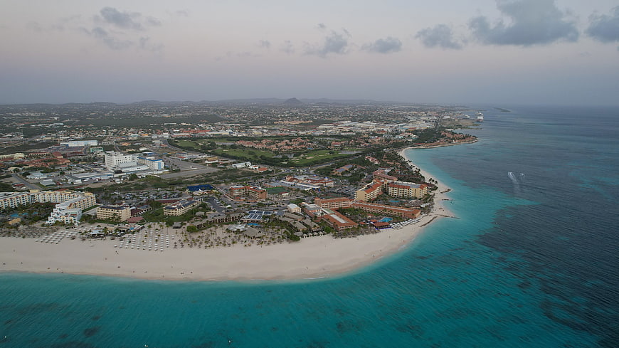Aerial View of Tropical Beach Resort and Coastal Town
