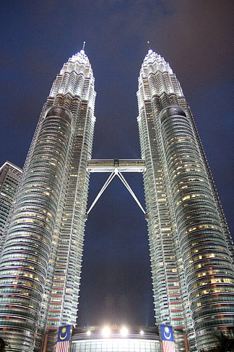 Low Angle Night View of Petronas Twin Towers Kuala Lumpur