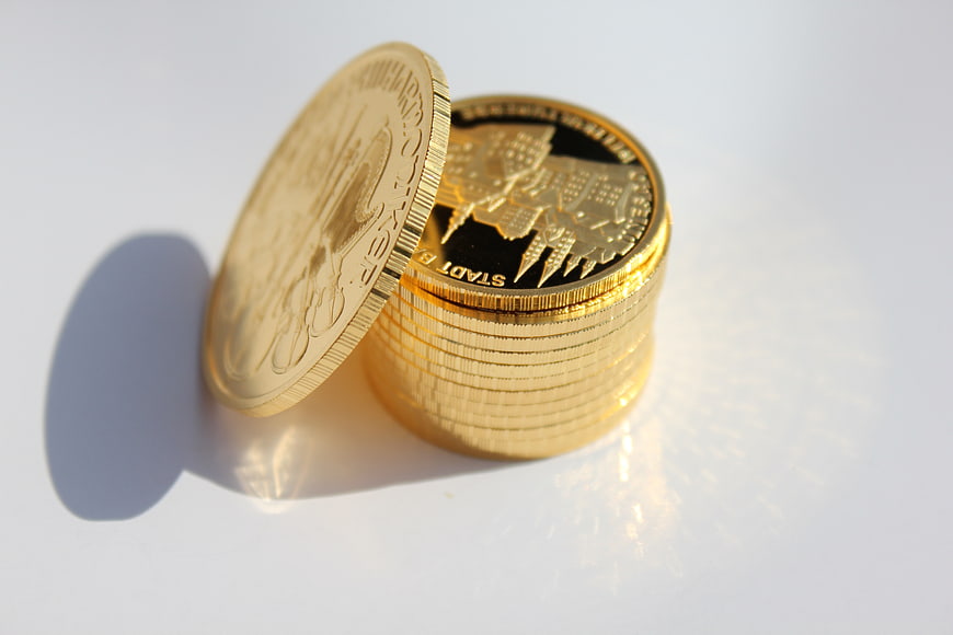 Gold Coins On White Background