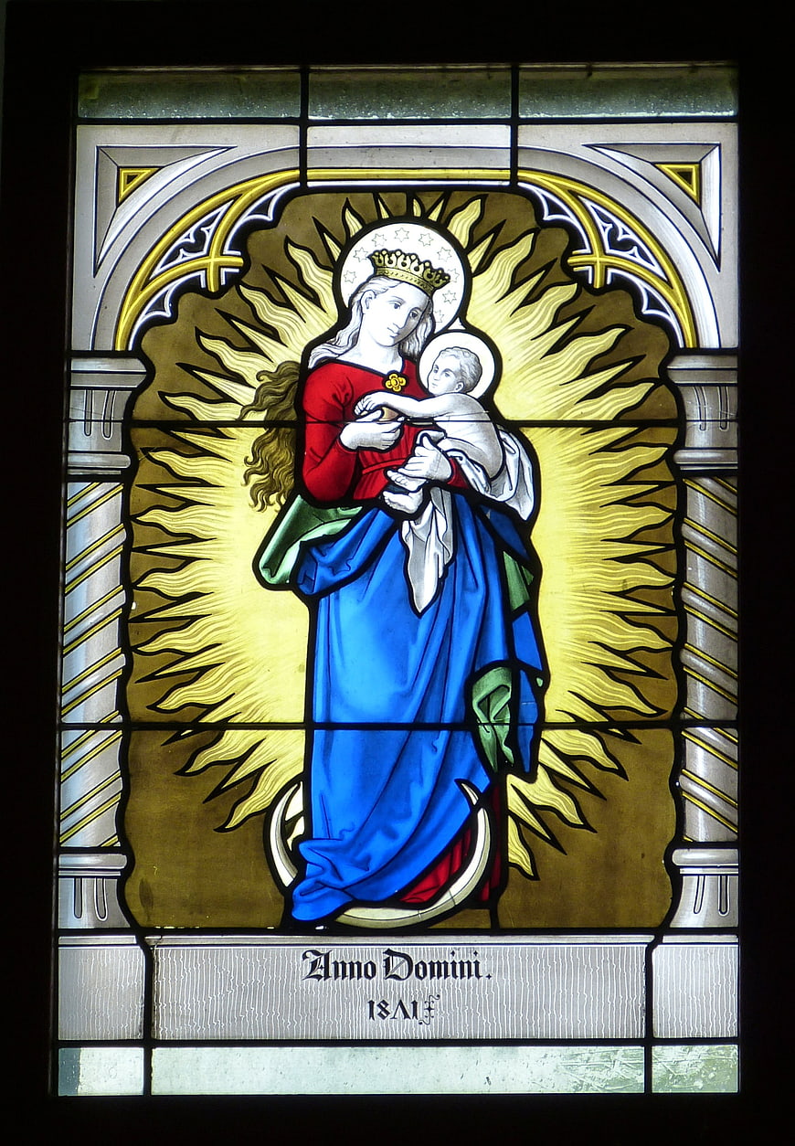 Historical Stained Glass Window Depicting Madonna and Child
