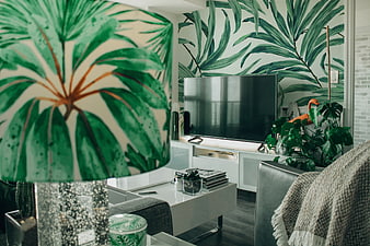 Modern Living Room with Tropical Leaf Wallpaper and Green Plants