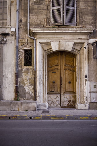 Vintage Wooden Door on Old European Street Facade