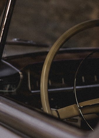Vintage Car Interior with Retro Steering Wheel