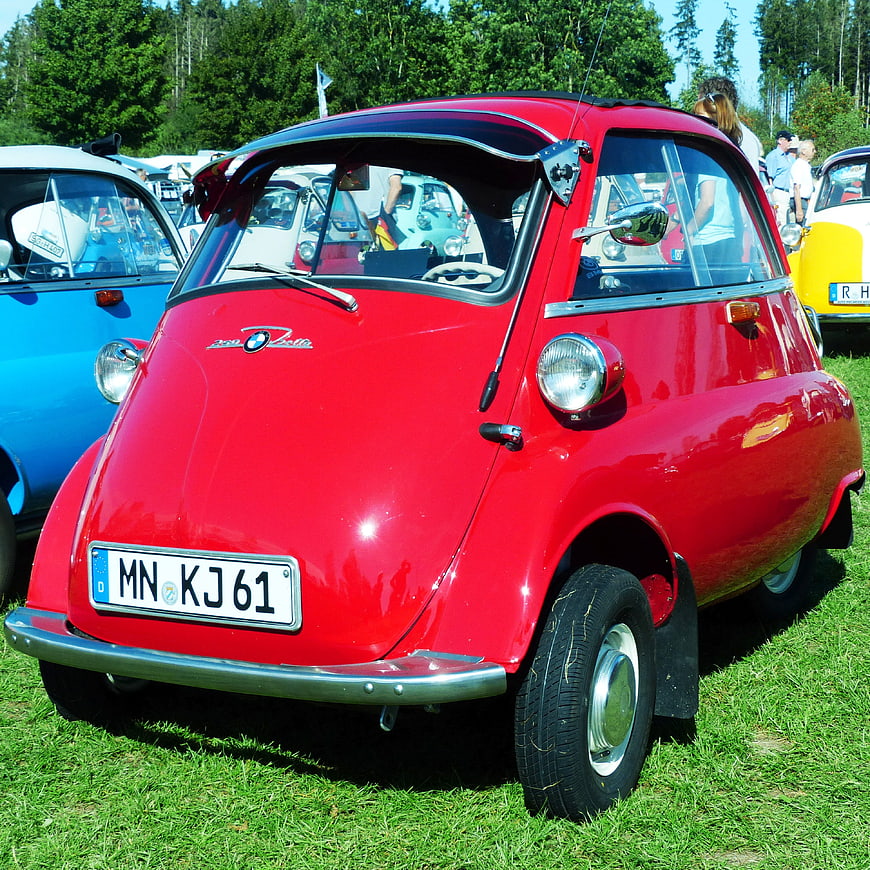 Red BMW Isetta Bubble Car at Outdoor Car Show