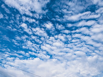 Blue Sky with Scattered Altocumulus Clouds