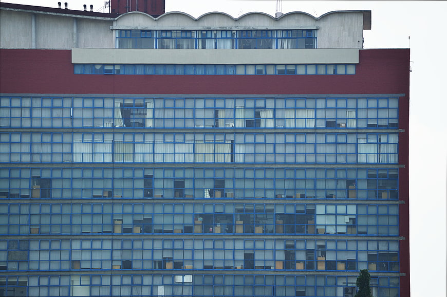 Modernist Office Building Facade with Blue Window Grid